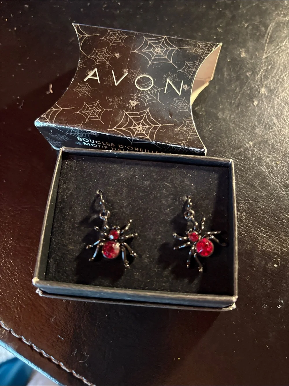 Avon Black Spider Earrings with Red Gem Centers